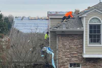 3 story home being repaired by roof wrox